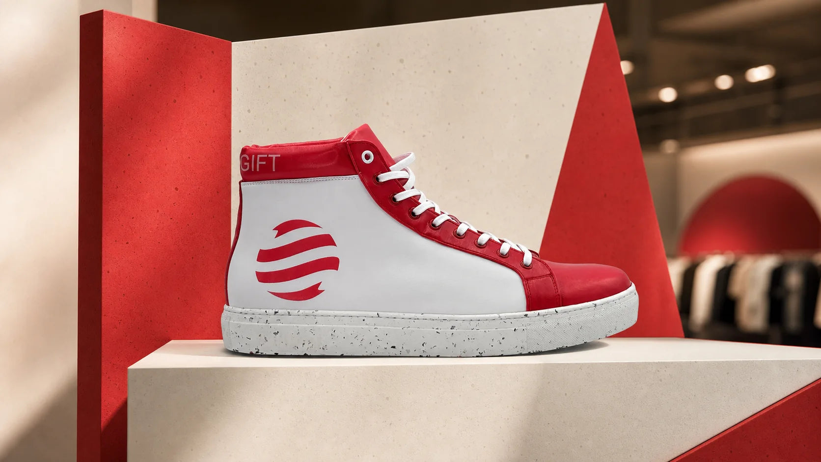Custom promotional high-top sneaker displayed in a marketing activation