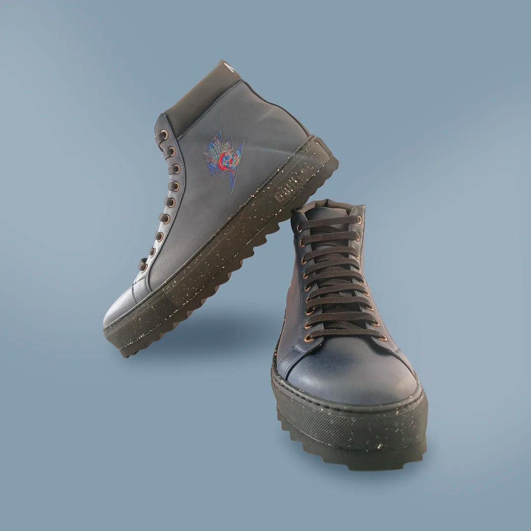 Custom high tops on a blue background